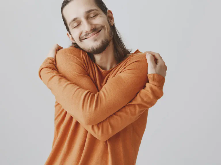 images/blog/happy-tender-handsome-man-close-eyes-hugging-himself.webp